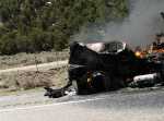 Yes the driver got out.  No idea what started the fire.